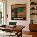 Vast Horizon geometric yarn wall art displayed above a wooden desk in a sunlit modern home office.