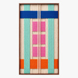 Frontal studio shot of the Vegas Strip rectangular hand-woven wool tapestry with bold geometric patterns in a wooden frame.