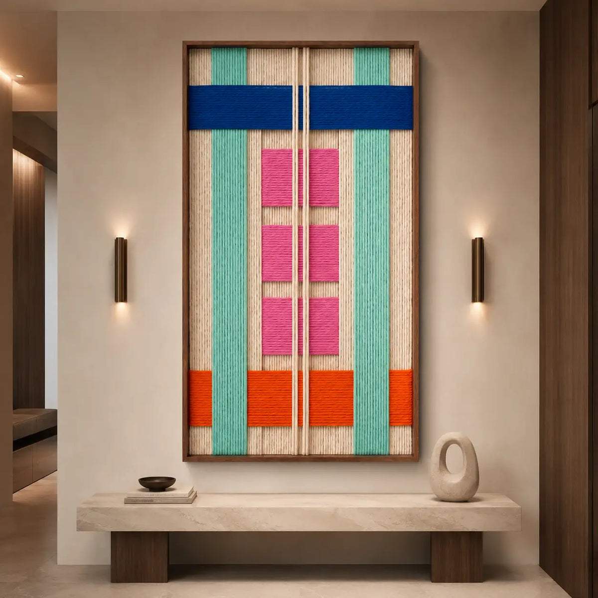 The Vegas Strip framed wall art hanging above a wooden bench in a bright, minimalist entryway or hallway setting.