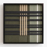 Frontal studio shot of the Verdant Silence square framed wall art featuring a sophisticated green, black, and cream geometric tapestry.