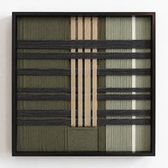 Frontal studio shot of the Verdant Silence square framed wall art featuring a sophisticated green, black, and cream geometric tapestry.