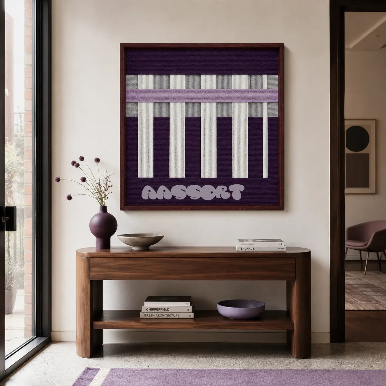 Violet Aftershock purple lavender and white textile wall art displayed above a walnut console in a softly lit modern entryway.