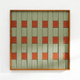 Direct front view of the soft cotton cord fiber artwork showing the intricate textured weave and geometric pattern in a light wood frame.
